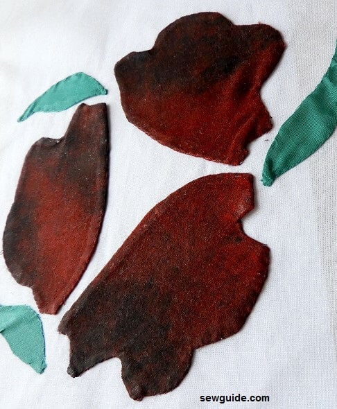 all applique pieces stitched down with tiny hand sewing stitches