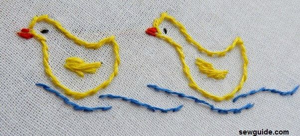 small ducks embroidered in yellow color thread