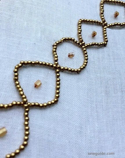 beading borders with a wavy pattern