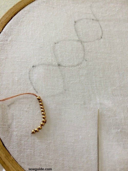 wavy pattern drawn on the fabric.