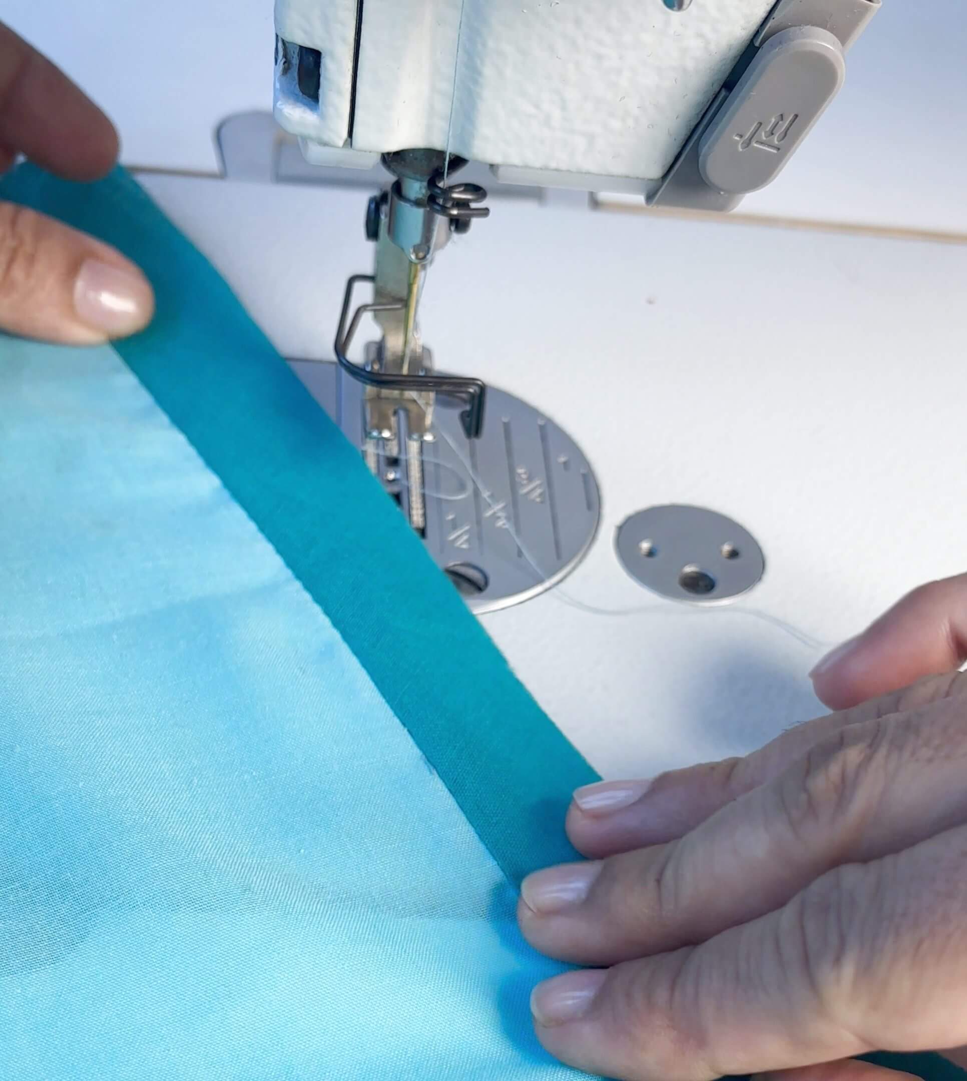 bring the fabric strip to the other side. Press