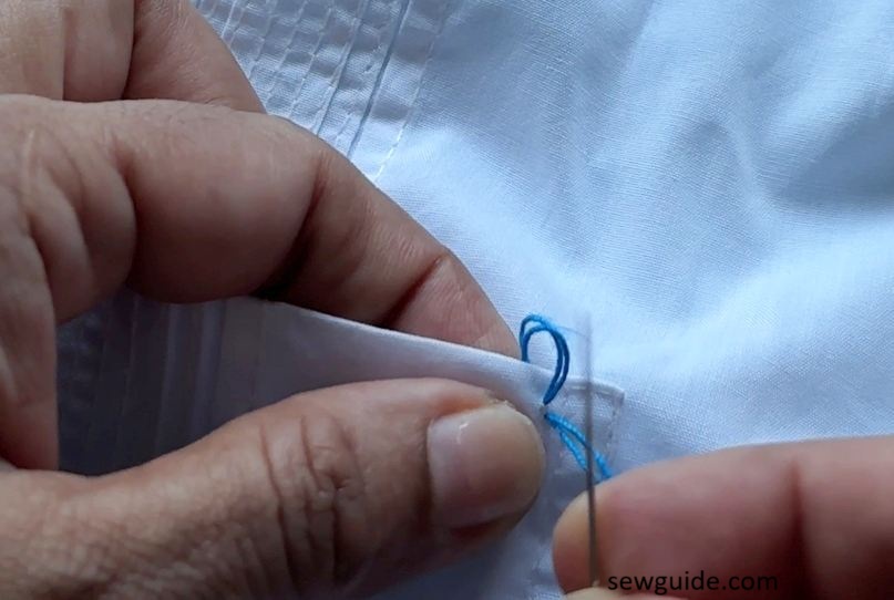 insert needle through the hoop