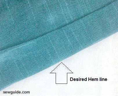 Mark and fold at the desired hem line for the blind hem