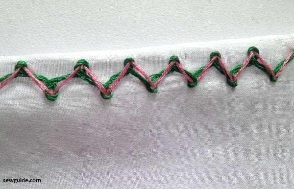 Looped arrow head stitch Border design