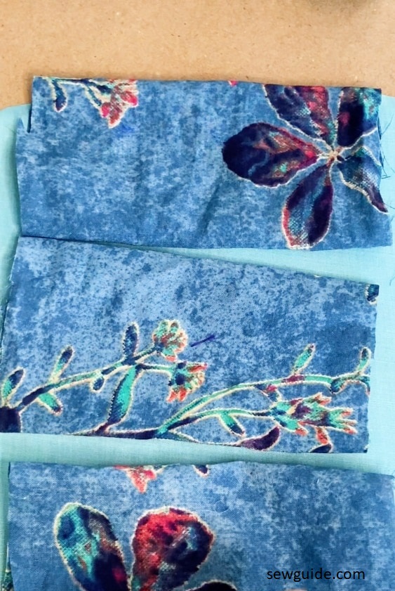 cut fabric tube into shorter pieces for bow