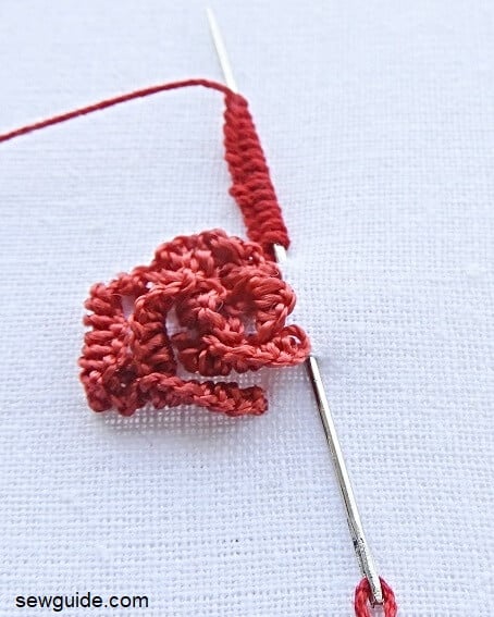 Make several cast on stitches around a circle to make a rose