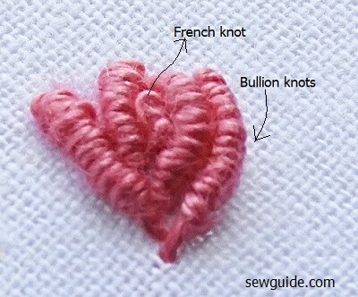 French knot in the middle and then bullion knots around the french knot