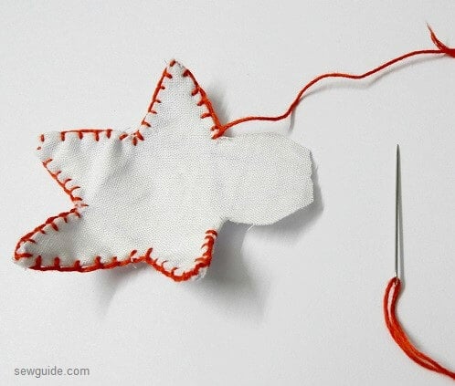 sew the edge of the star with blanket stitch