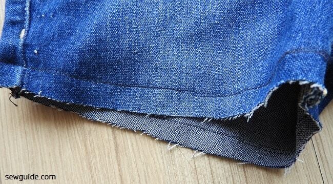 jeans hem edge cut straight across