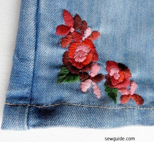 Embroidery made along the hem of jeans
