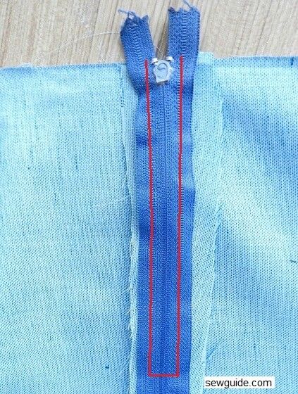 Sew the zipper along the zipper tooth