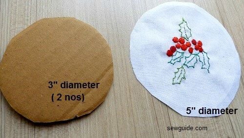 cut out the embroidery for the christmas decorations and cardboard of 3 inches