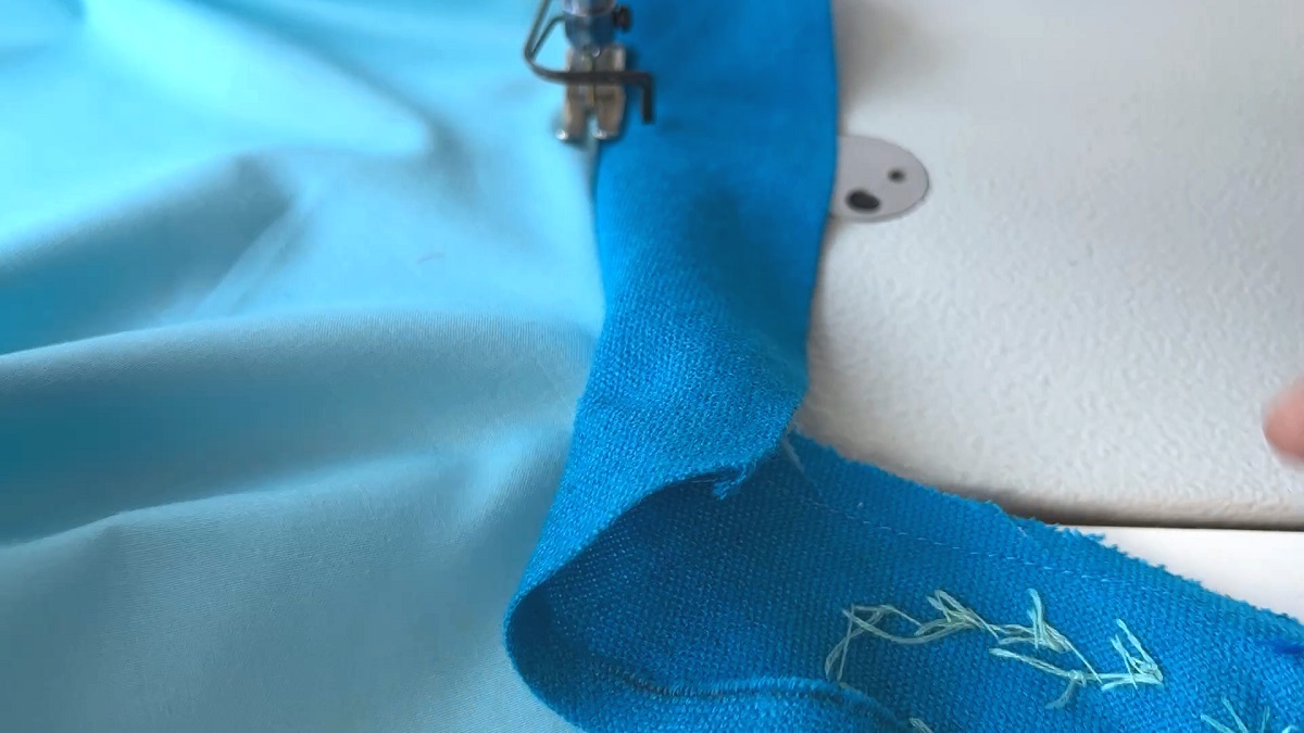 sew facing seam allowance to the garment