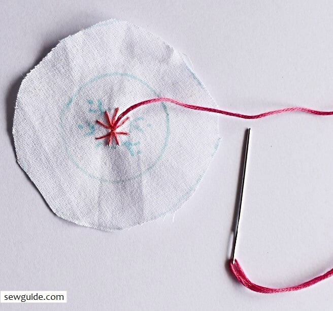 start embroidering inside the area for the embroidered pendants