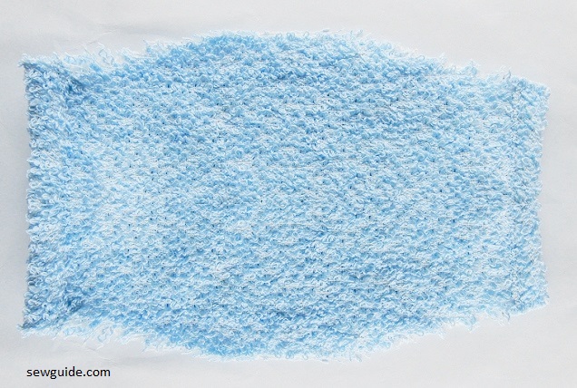 Bind the side edges of the mask