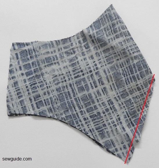 sew the dart closed on the mask fabric