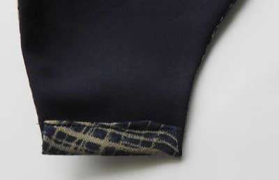 Turn the edges of the mask to the inside making a casing