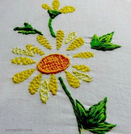 Heringbone stitches are made inside the petals.