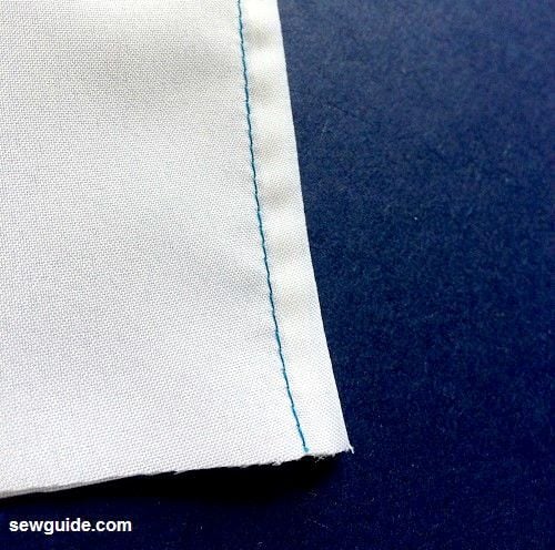 Sew the edge enclosing the cut edges
