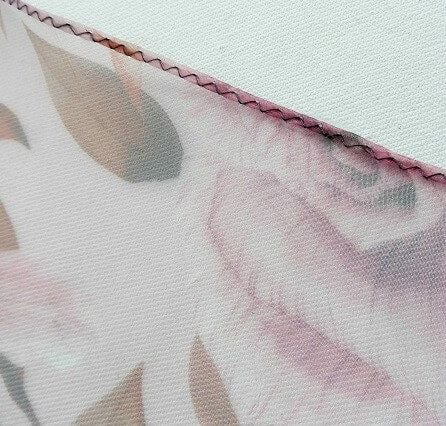 use hemer foot to roll the edges of the sleeve frills 