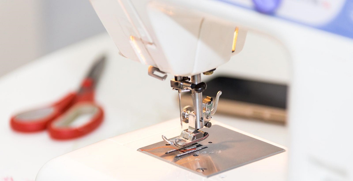 threading a sewing machine.