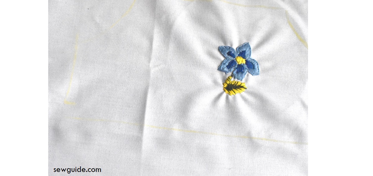 do the embroidery after marking the fabric