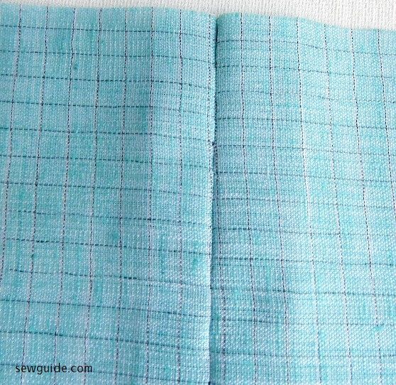 Ladder stitches disappears into the seam