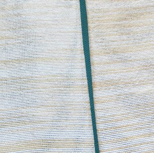 The folds of the fabric should be brough together