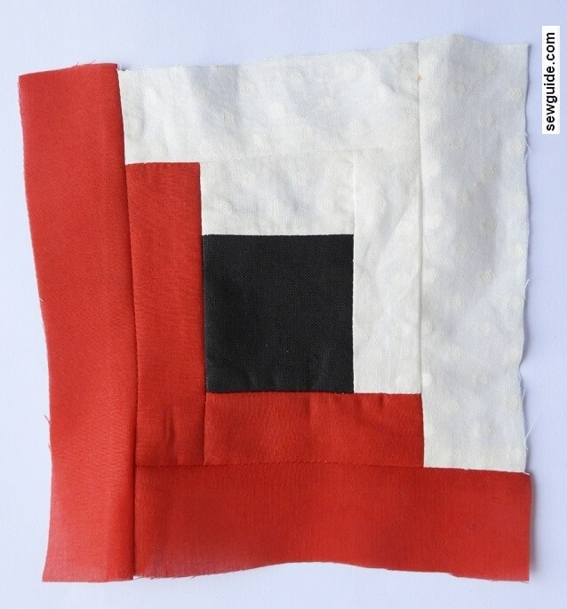 join all the fabric pieces to make the log cabin