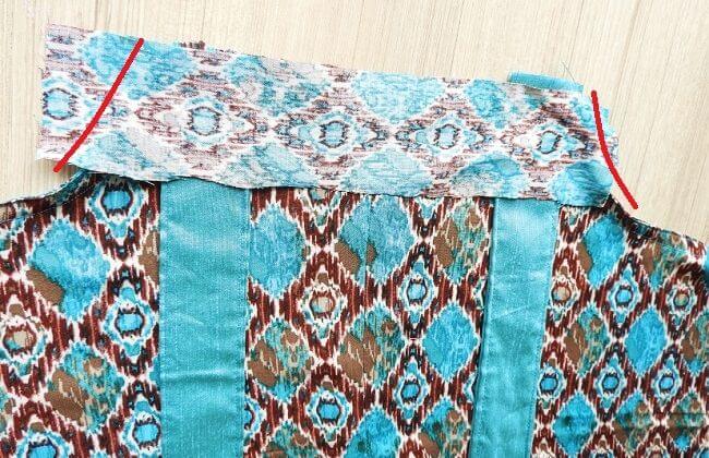 keep the straps face down on the top bodice and keep facing on top so that the straps are sandwiched inside