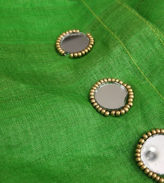 beads attached around the mirror