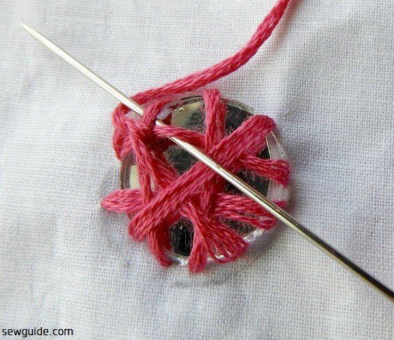 Start making blanket stitches over the straight stitches