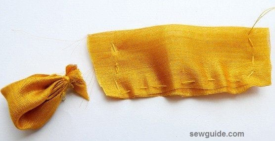 gather stitches to form a petal for the pansy