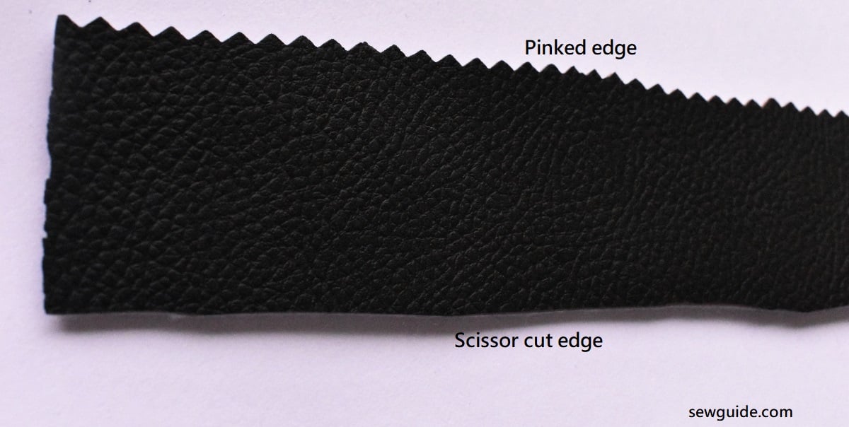 Faux leather cut on one side with normal scissors and the other side with pinking shears
