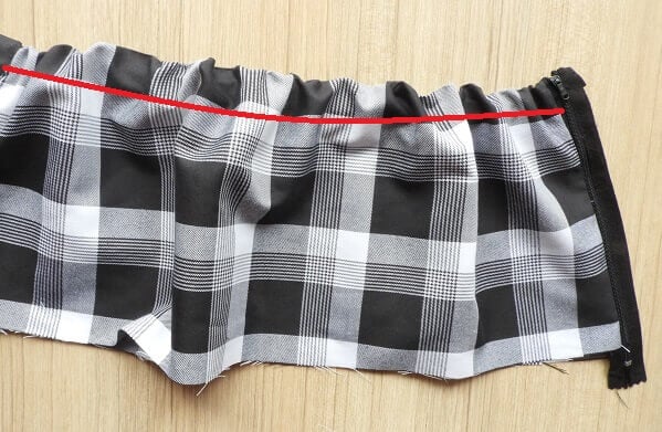 sew under the elastic on back yoke