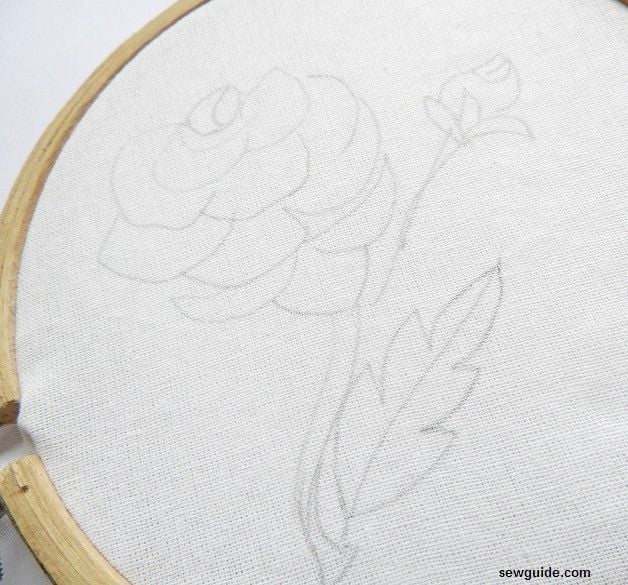 drawing of a rose on the fabric 