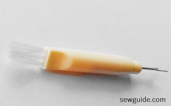 seam-ripper with a brush on the other end