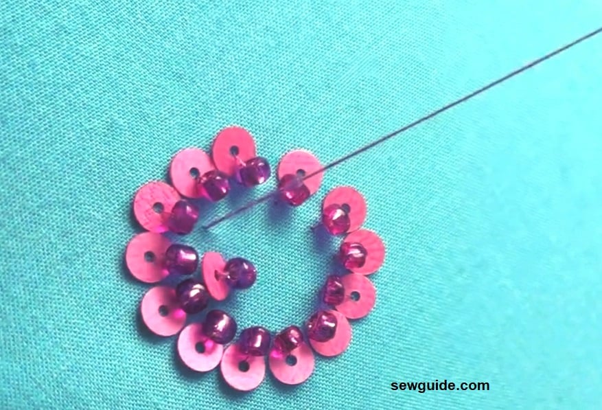 continue stitching sequins around the circle