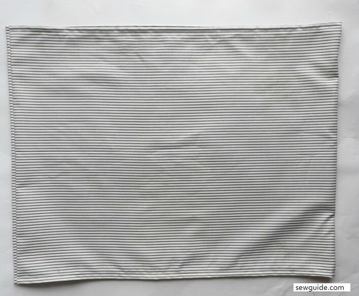 hem the top and bottom edges of the shirred tube top - strapless top