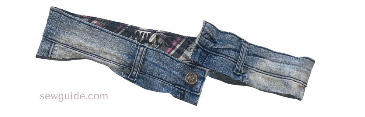 waistband of the jeans