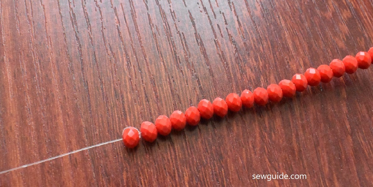 Beads strung with one bead tightened on the thread