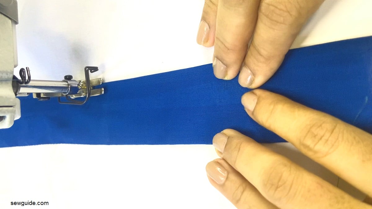 Insert the sleeve inside the striped fabric