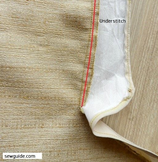 understitch the seam allowance and the facing together