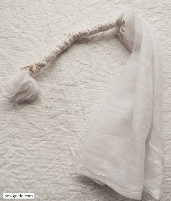 Twist and tie fabric with string