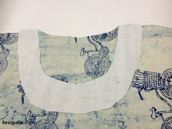 keep the facing face down on top of the tunic top