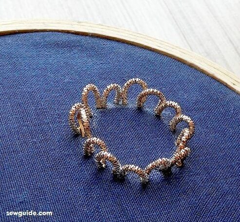 make several loops with the metallic thread for the zardosi work