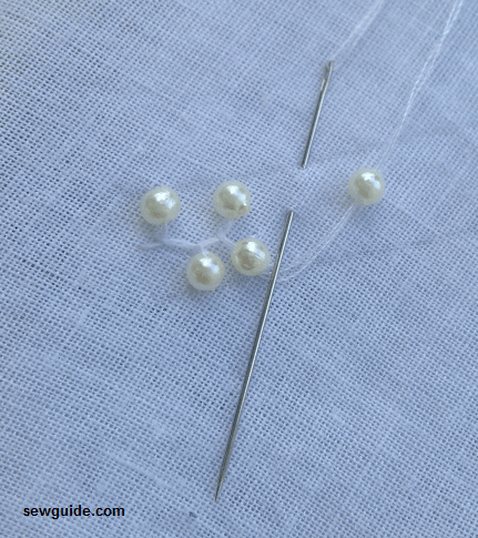 cretan stitch with beads.