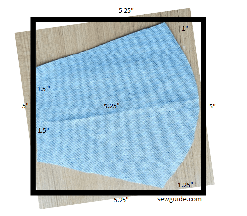 cut out a 5.25 inch square fabric in the shape given